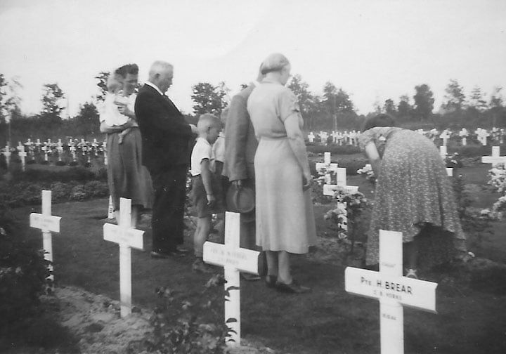 George's parents visiting his grave