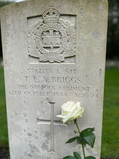 Thomas Briggs grave with rose