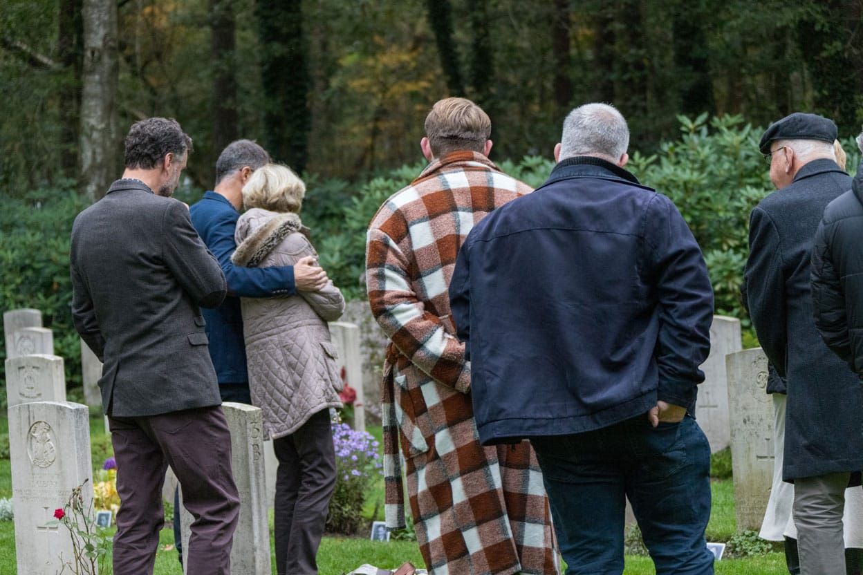 Family and adopters of the grave of Jack Barnard